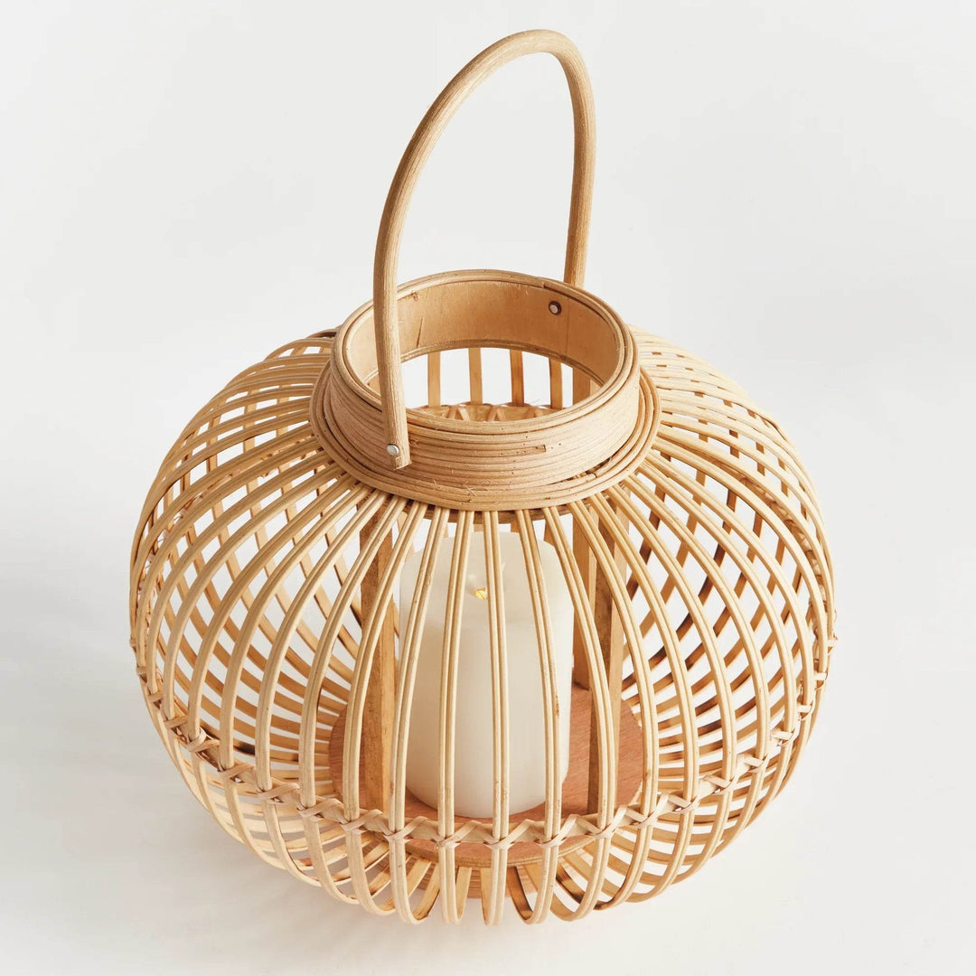 Top-down view of modern natural rattan lantern showing bamboo weave and built-in LED candle

