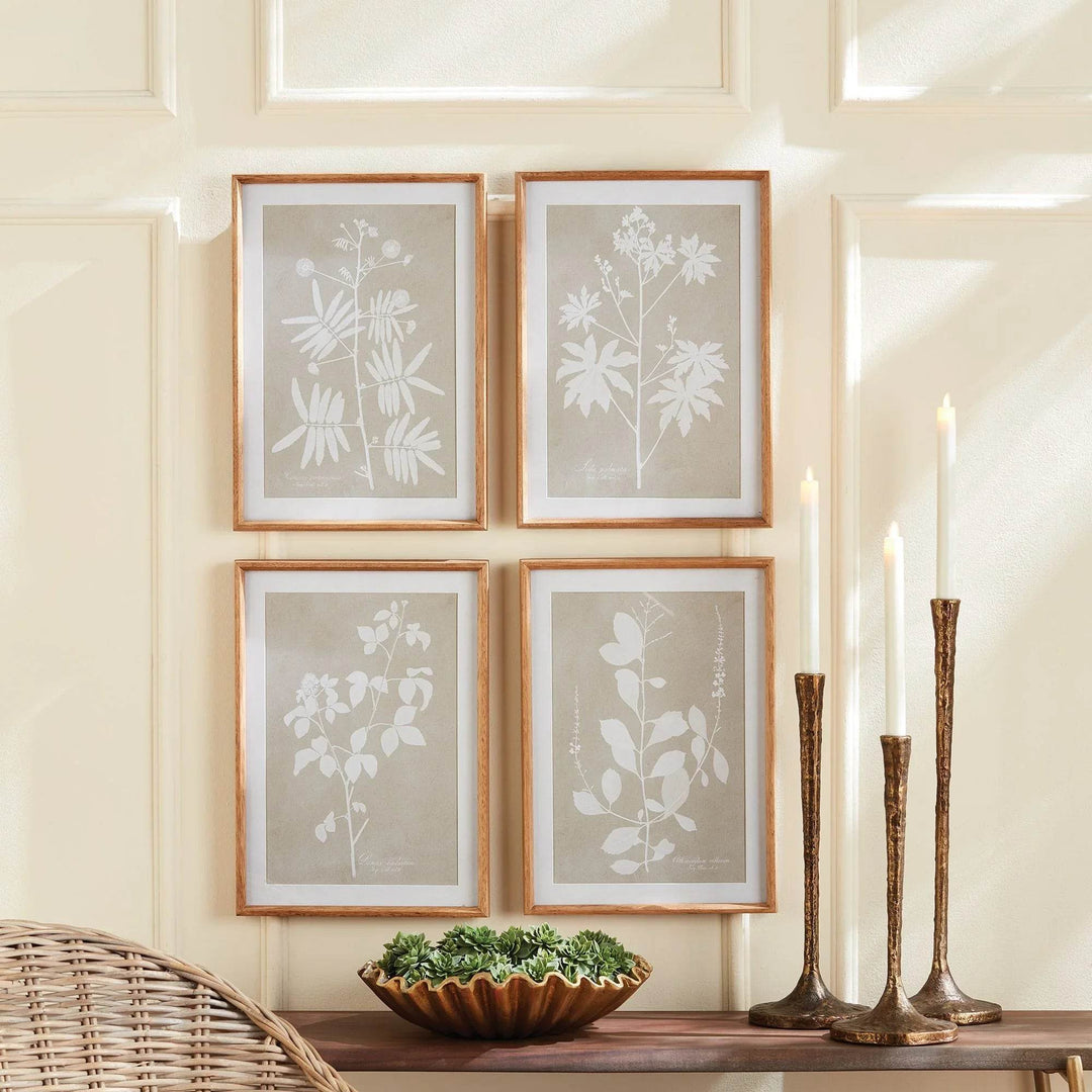 Styled wall decor scene showing four-piece modern organic botanical print set.
