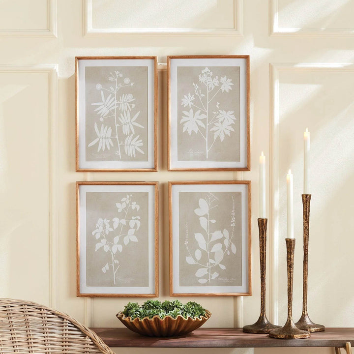 Styled wall decor scene showing four-piece modern organic botanical print set.