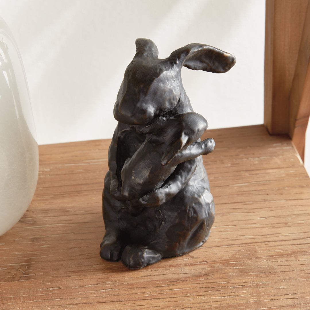 Right side view of black and bronze mother rabbit sculpture, textured aluminum animal figurine, rustic decor