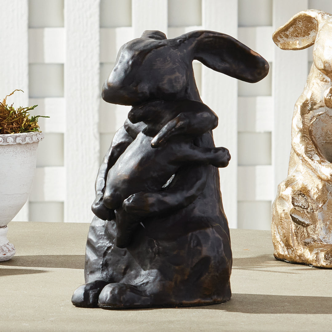 Black and bronze mother rabbit sculpture styled on tabletop, aluminum animal figurine with textured finish, rustic decor