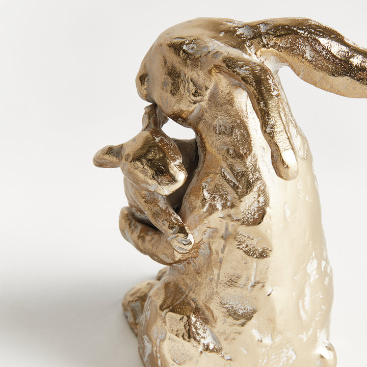 Full view of gold mother rabbit sculpture with baby in white ash gold finish, aluminum decorative animal, rustic decor