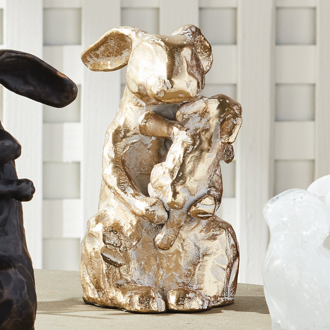 White ash gold mother rabbit sculpture styled on tabletop, aluminum animal accent with warm metallic texture, rustic decor