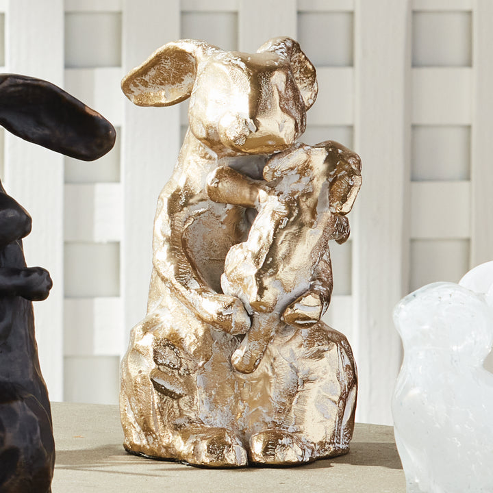 White ash gold mother rabbit sculpture styled on tabletop, aluminum animal accent with warm metallic texture, rustic decor