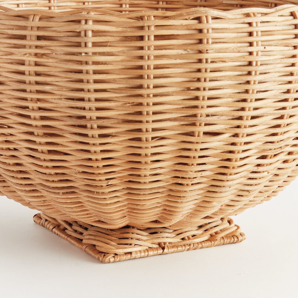 Natural rattan footed bowl close-up showing fine woven strands and the wrapped square pedestal base - Coastal Transitional