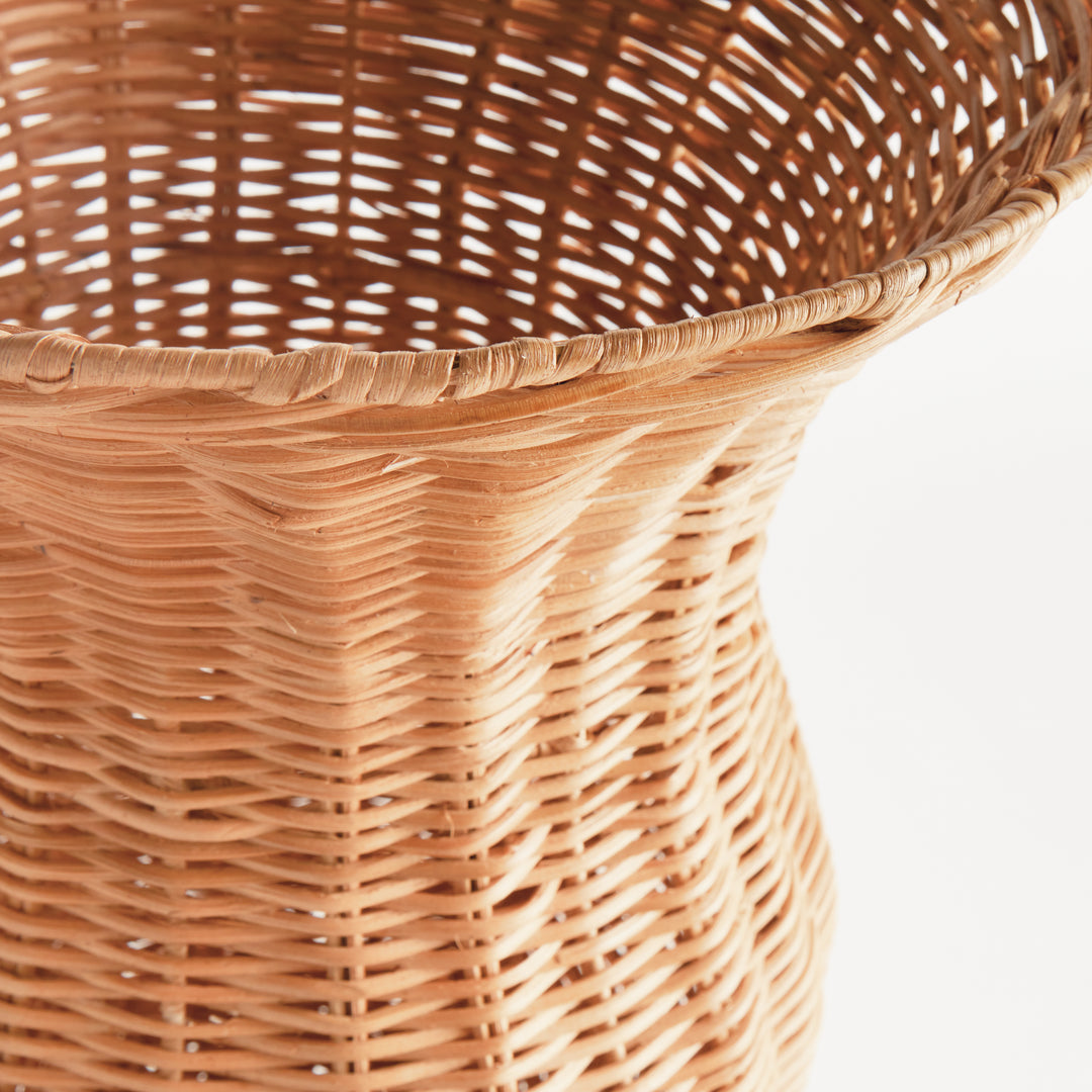 Close-up of the natural handwoven rattan urn flared rim highlighting woven craftsmanship and organic texture – Coastal.