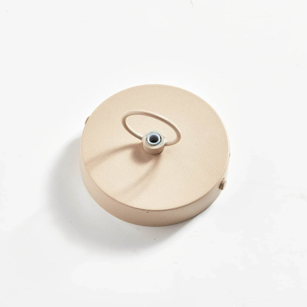 Round ceiling canopy for natural rattan pendant light, showing the pale finish, central fitting and mounting plate in Coastal