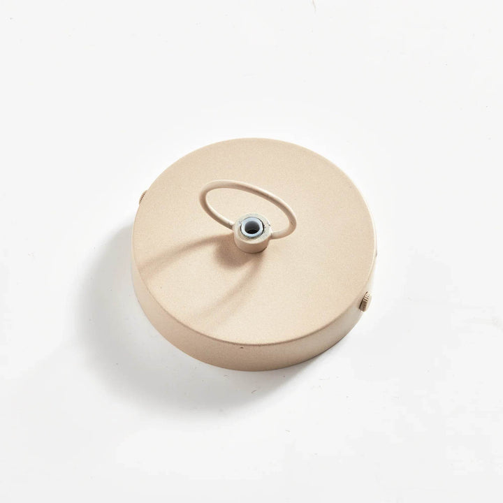 Round ceiling canopy for natural rattan pendant light, showing the pale finish, central fitting and mounting plate in Coastal