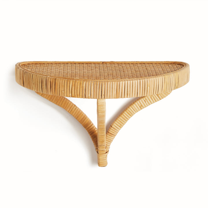 Front-facing view of natural rattan woven wall bracket with demilune shelf form – Boho Coastal style