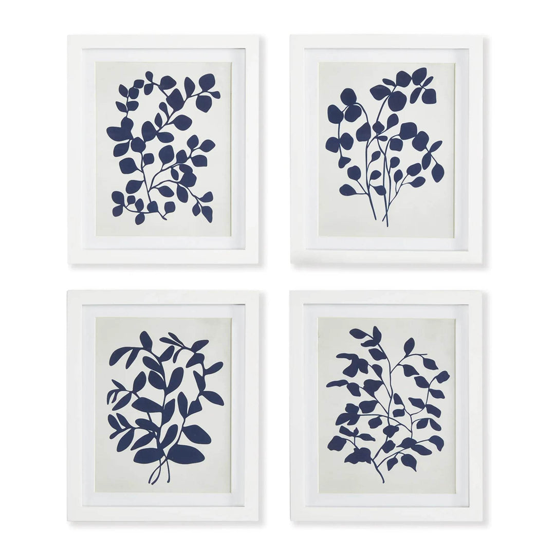 Navy botanical leaf art print set of 4 framed on white wall gallery-style.