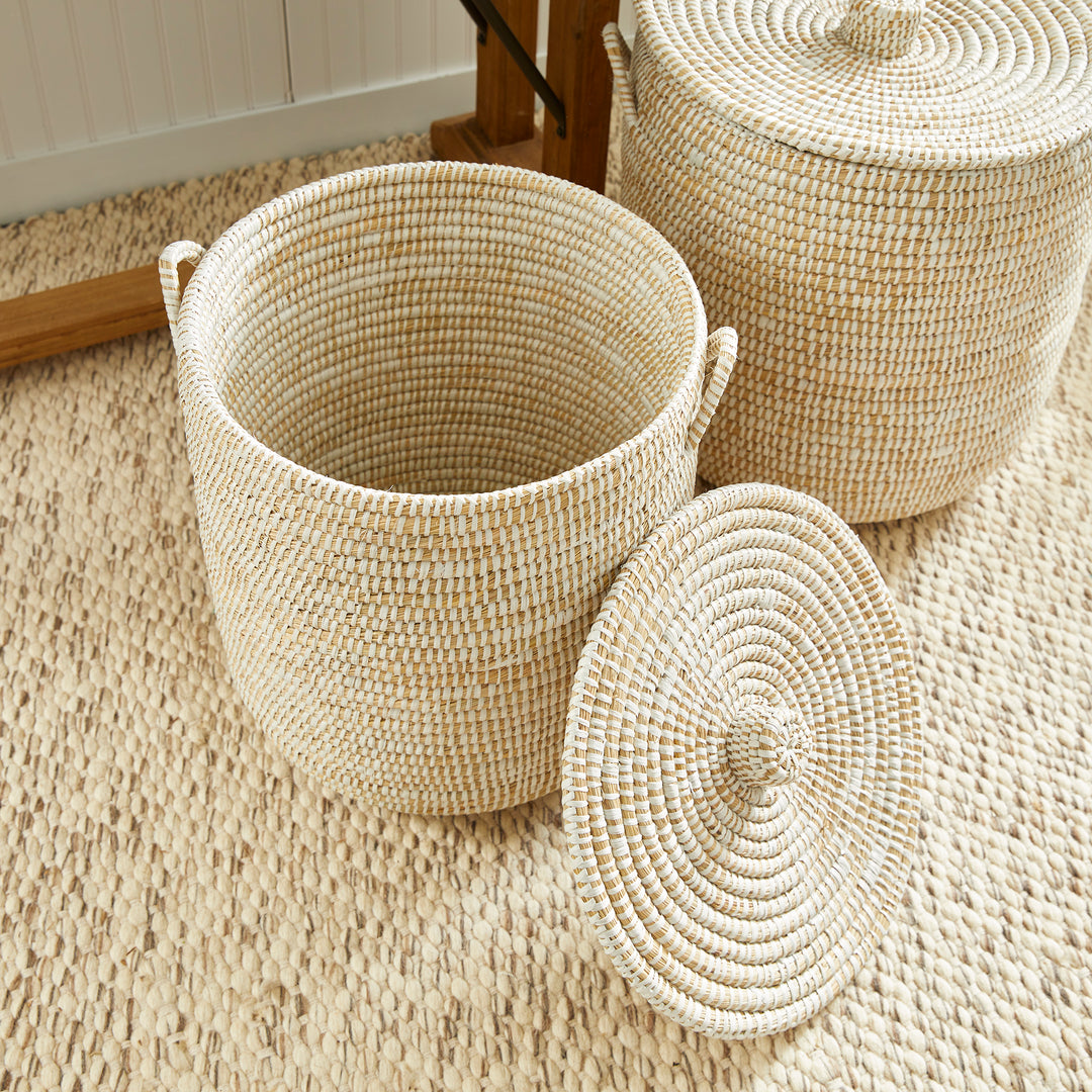 Open handwoven rivergrass hamper basket with side handles and matching lid for laundry or blanket storage – Coastal Organic.