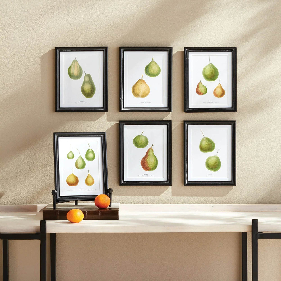 Framed pear print set styled as gallery wall above console with tray and fruit – Vintage Botanical.