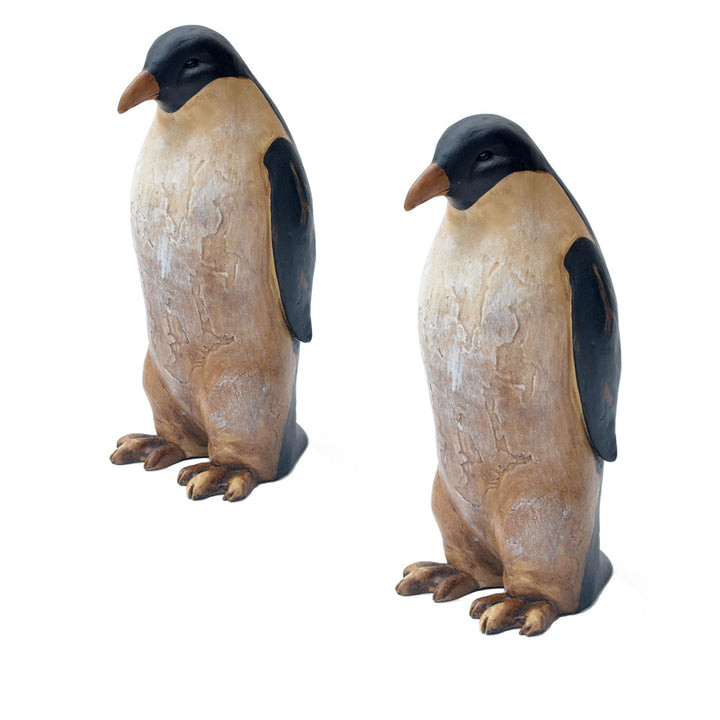 Set of Two Decorative Penguin Statues – Studio View Against White Background