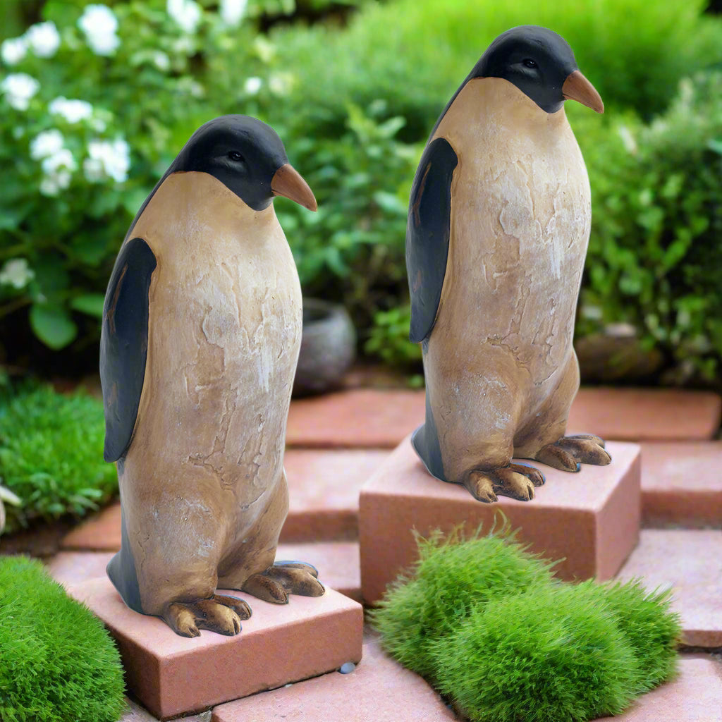 Set of Two 8.5" Penguin Garden Sculptures on Stone Pavers with Lush Greenery – Outdoor Decor