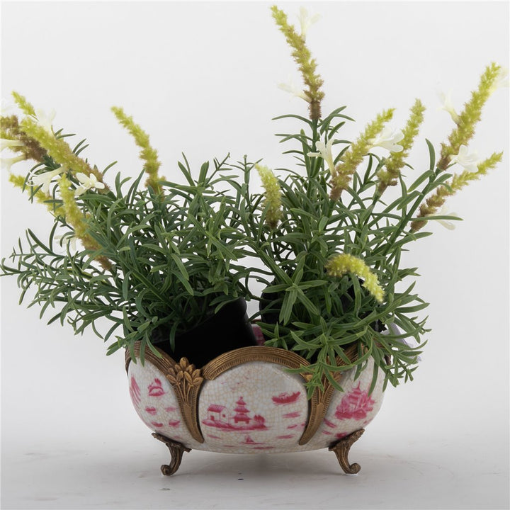 Pink chinoiserie porcelain decorative bowl styled with greenery and bronze ormolu accents – Traditional style