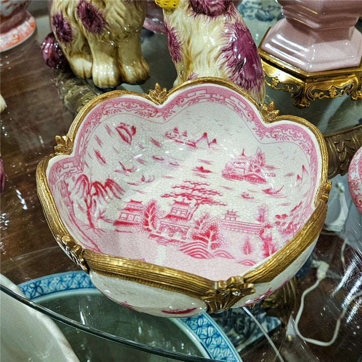 Overhead view of pink chinoiserie porcelain decorative bowl with scenic landscape motif – Traditional style