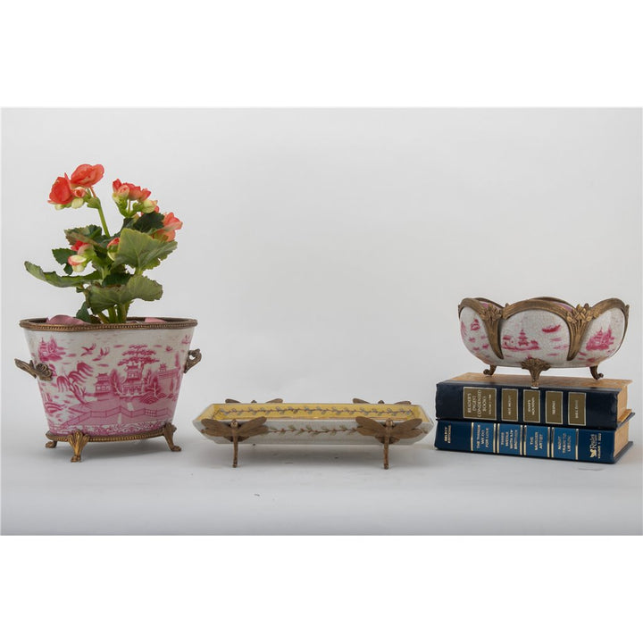 Pink chinoiserie porcelain decorative bowl styled as tabletop accent with floral arrangement – Traditional style