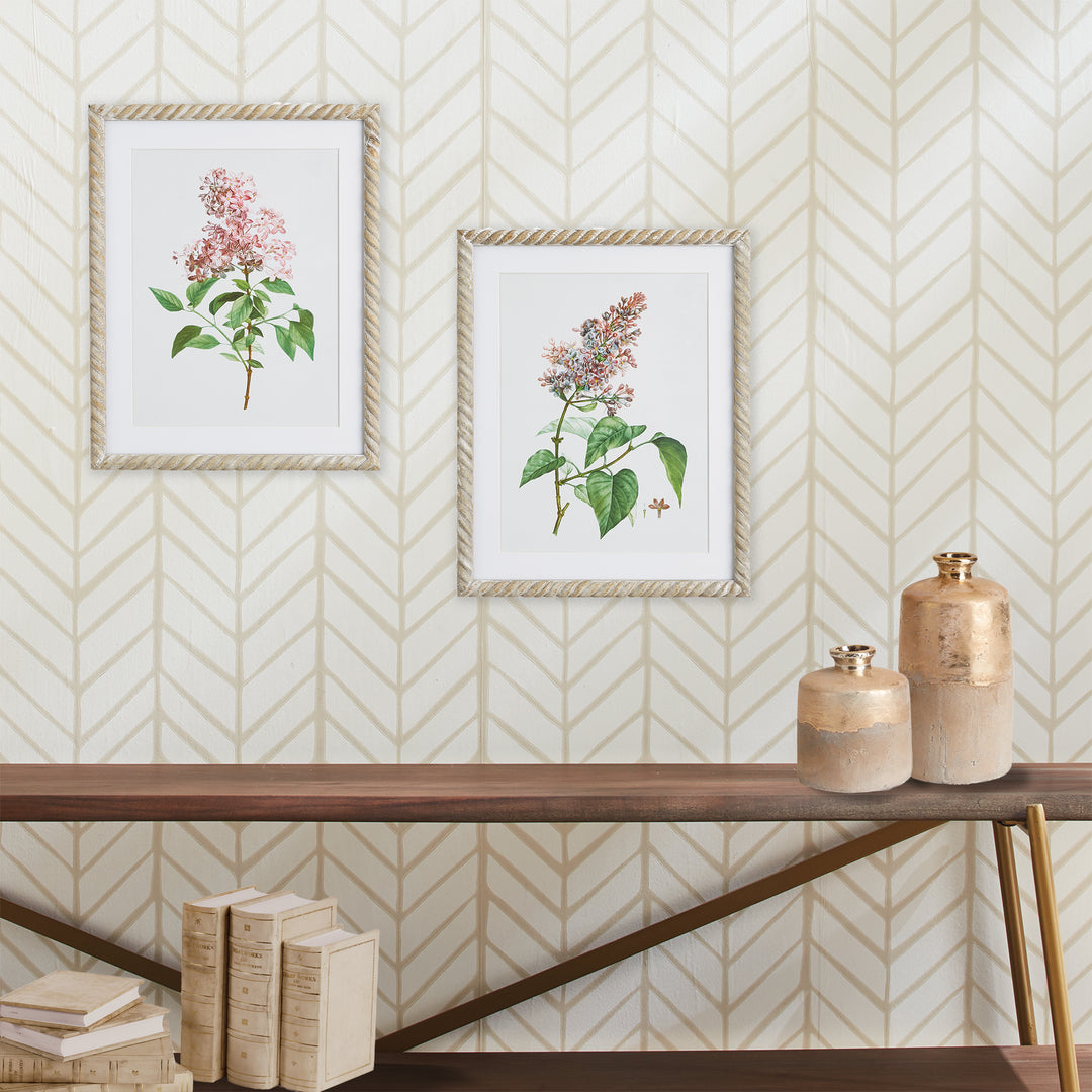 Two framed lilac botanical prints hung above a console, with pink flowers and pale mats in neutral room setting, Traditional