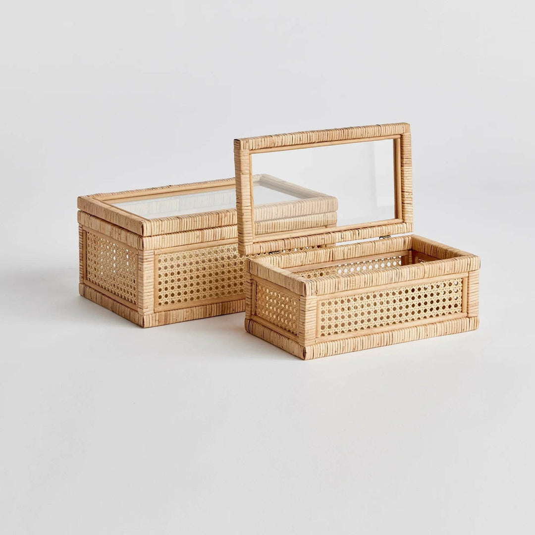 Set of two rattan display boxes with cane webbing and glass lids; one open to show storage, rectangular profile – Coastal