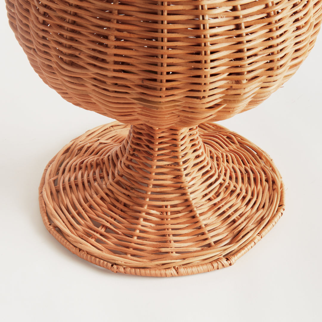 Close-up of the natural handwoven rattan footed urn pedestal base showcasing artisan weave and structural craftsmanship – Coastal.
