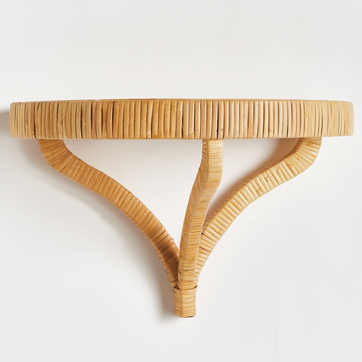 Side angle showing structure and shelf depth of curved rattan wall bracket – Scandinavian-inspired