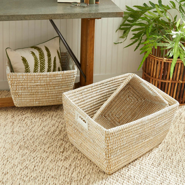 Open rectangular woven basket placed in a coastal home office, showcasing spacious interior and handcrafted texture.
