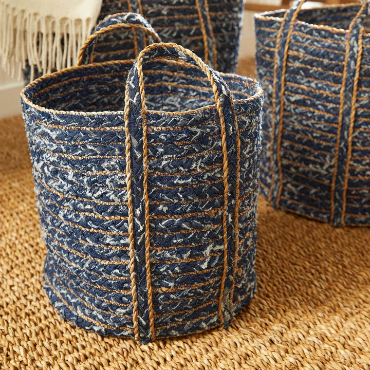 Group of three recycled denim storage baskets arranged in cozy natural home setting

