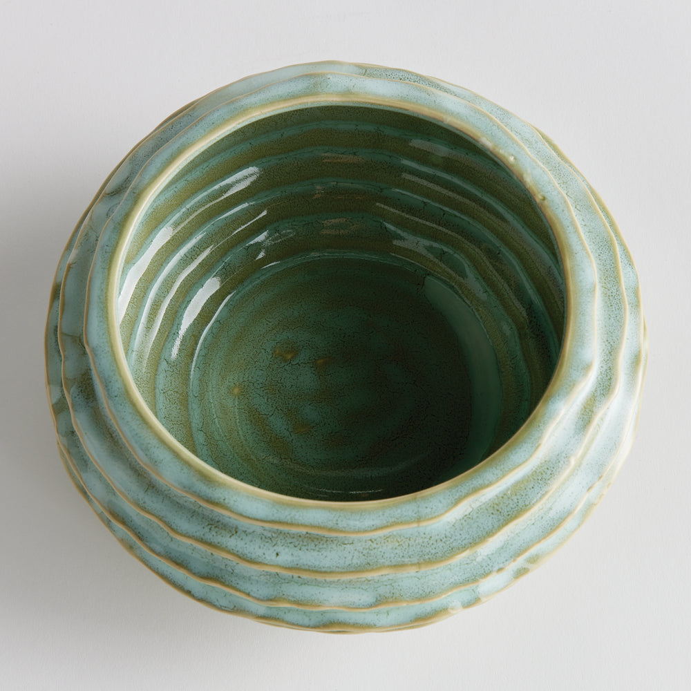 Top view of sage green ceramic bowl showing its reactive-glaze interior round opening and hand-finished ribs - Modern Organic