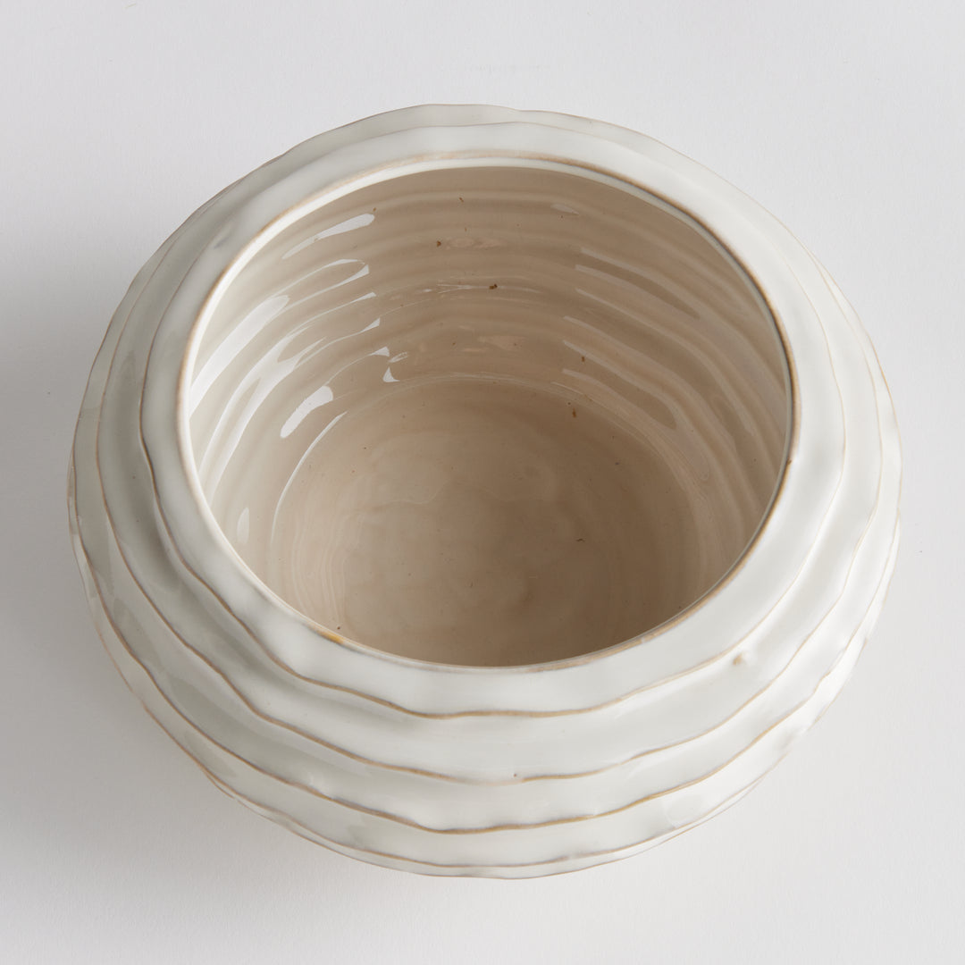 Top view of white ceramic decorative bowl showing a glazed interior, round rim and horizontal ribbing detail - Modern Organic