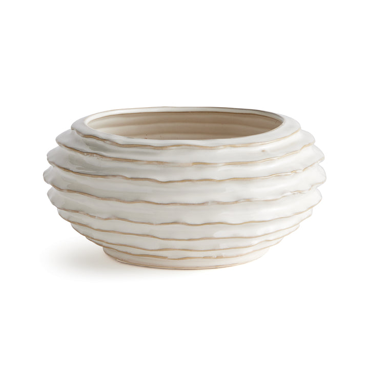 White ribbed ceramic decorative bowl with warm-toned edges, reactive glaze and a rounded silhouette on white - Modern Organic