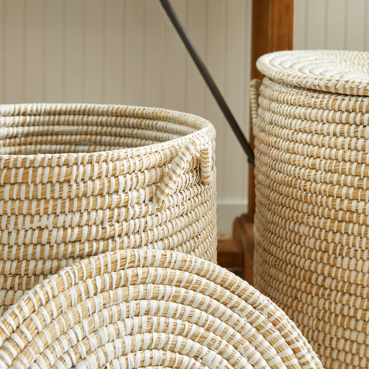 Close view of handwoven rivergrass basket weave with beige and whitewashed fibers and rounded lidded form – Coastal Organic.