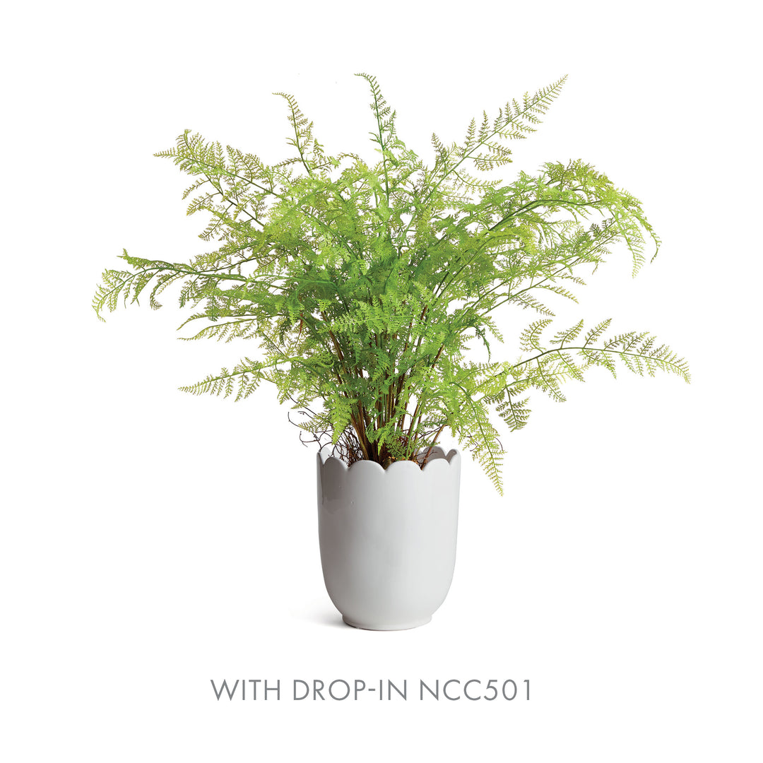 White scalloped clay cachepot styled with a spreading green faux fern drop-in, with the rounded vessel visible | Traditional
