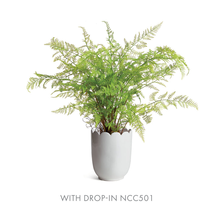 White scalloped clay cachepot styled with a spreading green faux fern drop-in, with the rounded vessel visible | Traditional