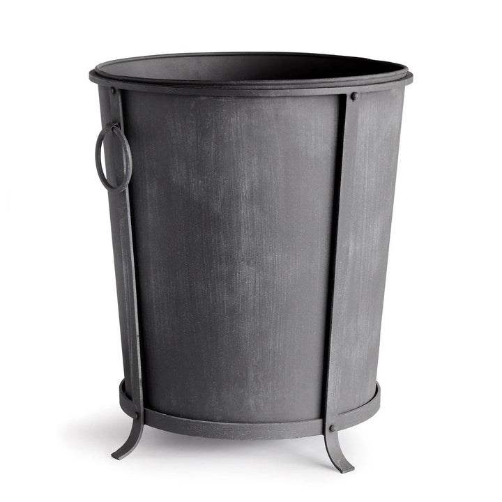 Large iron planter with a tapered round body, aged zinc finish, ring handles and a raised frame. Industrial Transitional