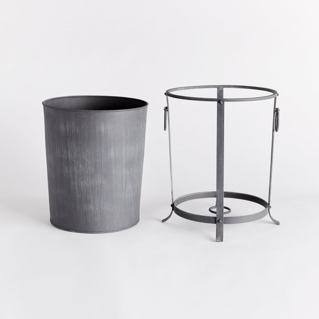Medium iron planter with its removable liner lifted out beside the support frame and ring handles. Industrial Transitional