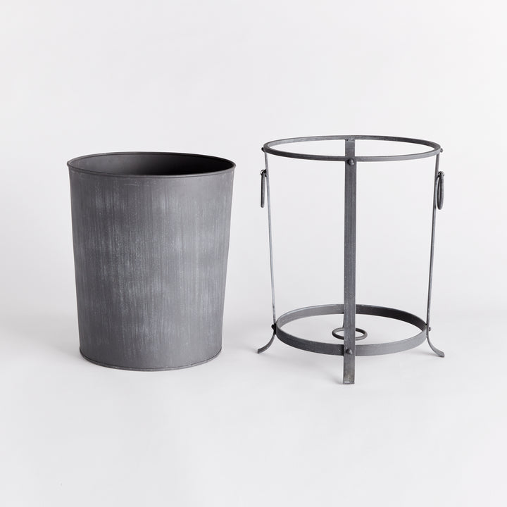 Medium iron planter with its removable liner lifted out beside the support frame and ring handles. Industrial Transitional