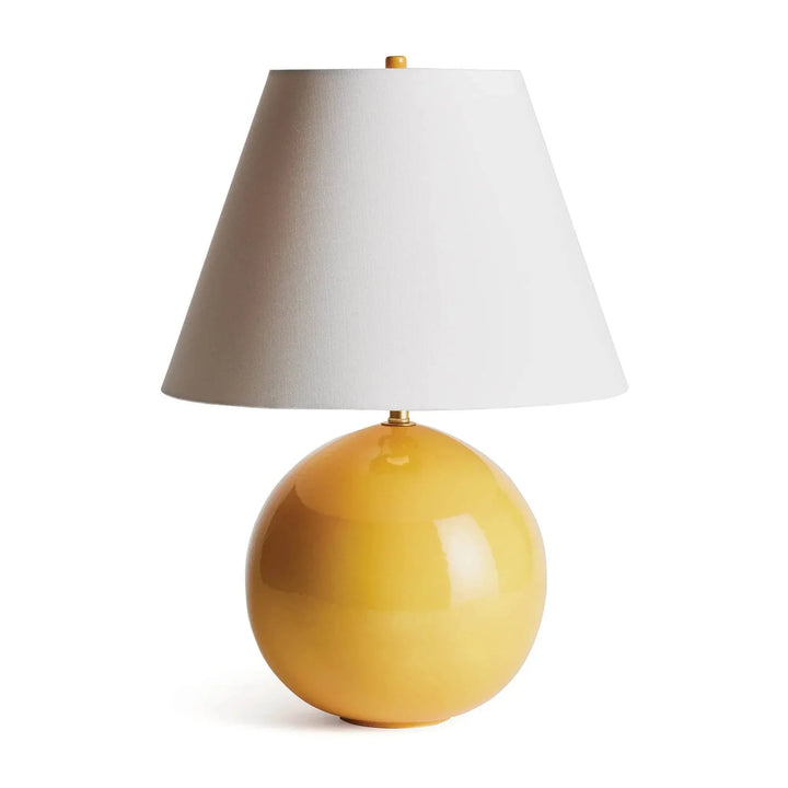 Round marigold ceramic lamp with a glossy spherical base and white linen empire shade on a pale background. Transitional