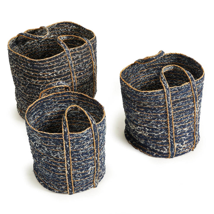 Handwoven denim baskets with natural fiber handles styled in modern casual room
