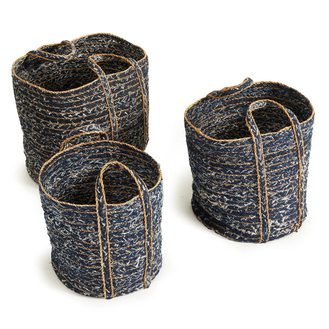 Handwoven denim baskets with natural fiber handles styled in modern casual room