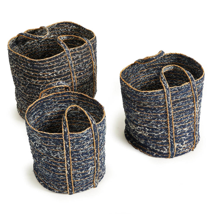 Handwoven denim baskets with natural fiber handles styled in modern casual room