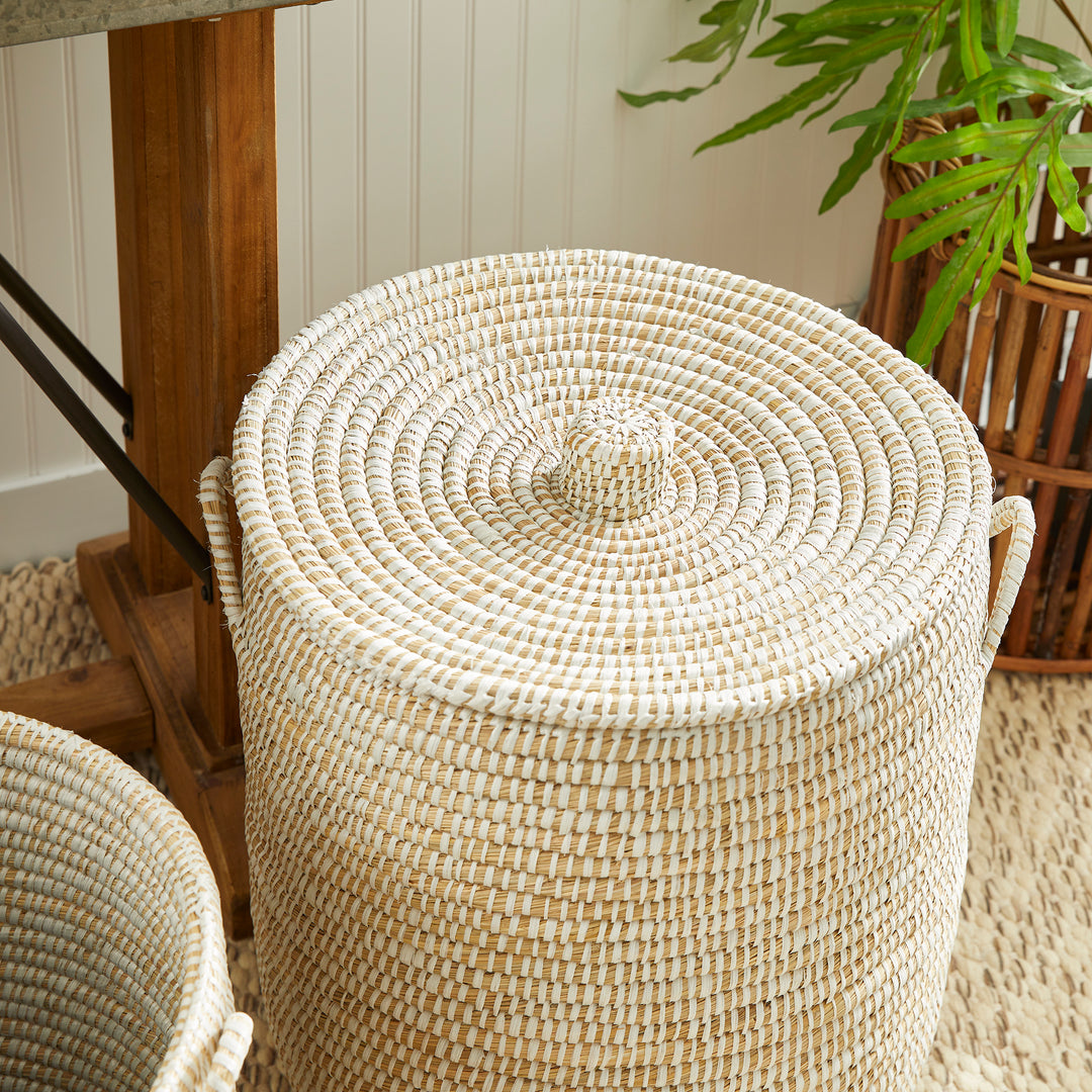 Round handwoven rivergrass basket with fitted lid and raised knob in natural and whitewashed woven finish – Coastal Organic.