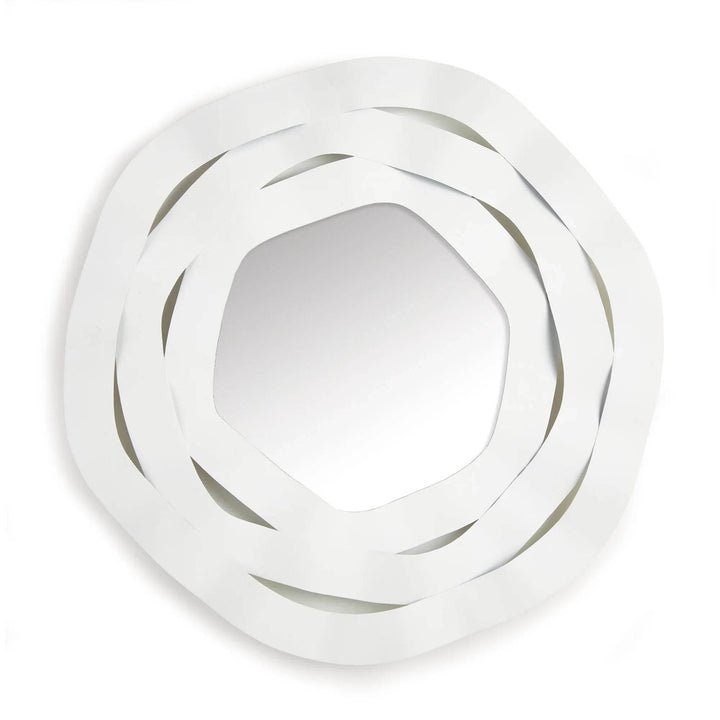 Front-facing image of round decorative mirror with sculptural white metal ribbon frame, ideal for modern or coastal interiors.

