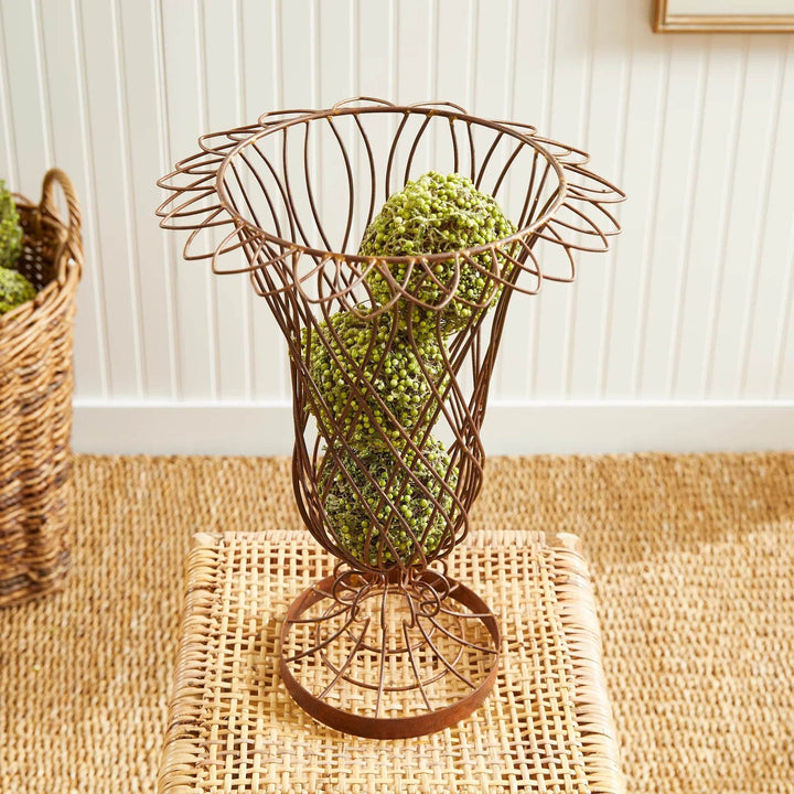 Close-up of wire vase rim and structure filled with green decorative spheres – Vintage Farmhouse style