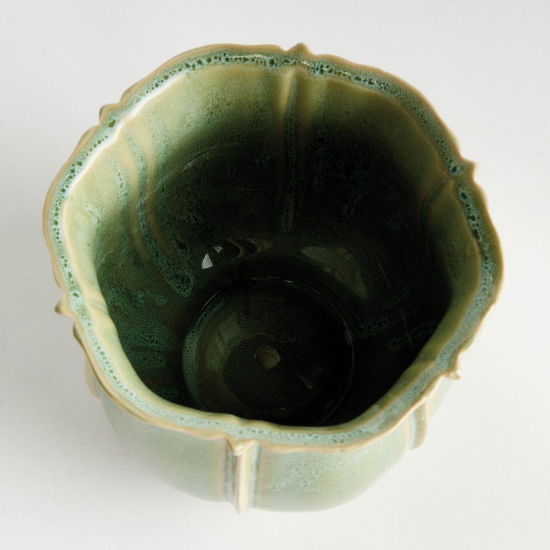 Top view of large green ceramic planter showing scalloped opening, glazed interior, and ribbed form – European Cottage