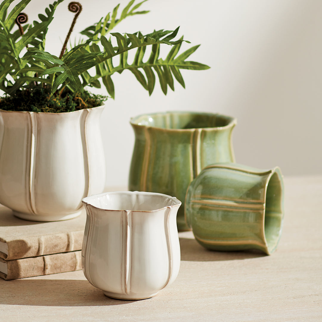 White and green ceramic planter pots with scalloped rims and artisan glaze styled with greenery – European Cottage