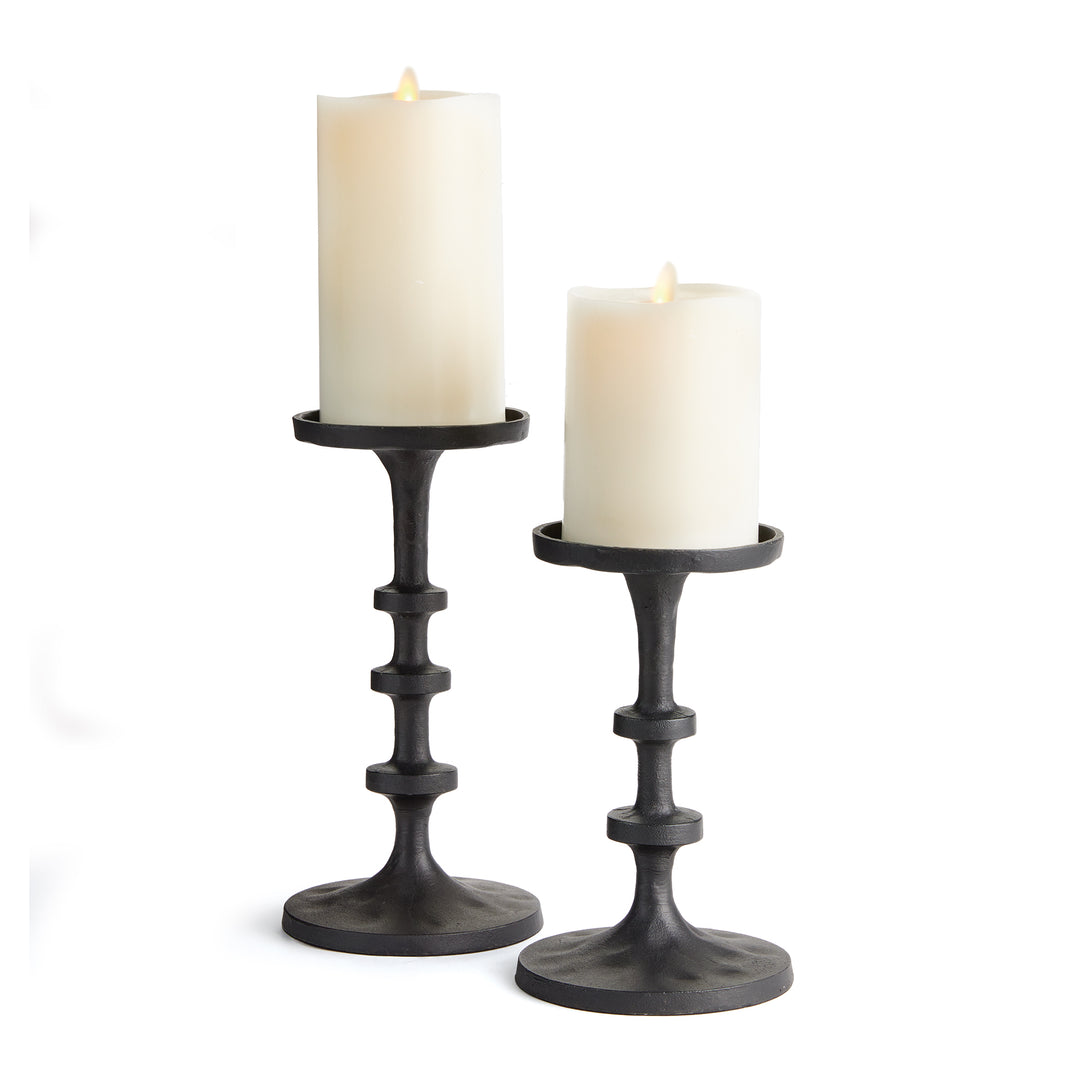 Black aluminum pillar candle holders set with stacked spindle detailing for modern tabletop decor – Transitional