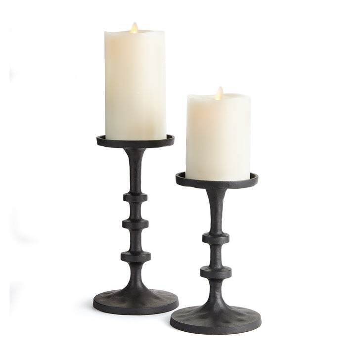 Black aluminum pillar candle holders set with stacked spindle detailing for modern tabletop decor – Transitional
