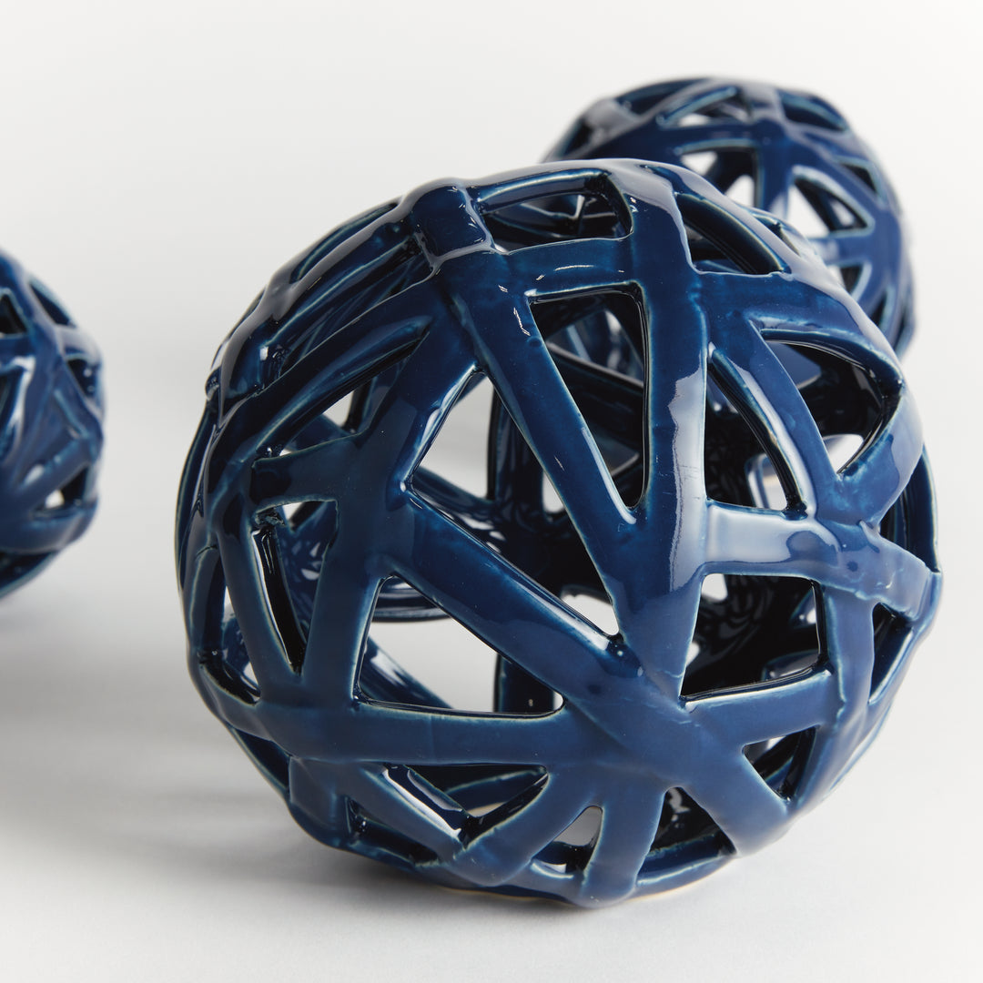Blue ceramic decorative orb grouping with open lattice construction and glossy artisan glaze – Sculptural Contemporary