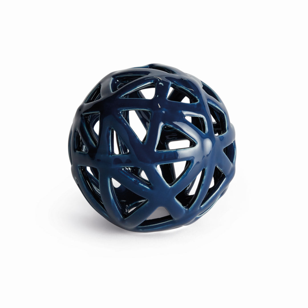 Blue ceramic decorative orb with dimensional open lattice structure and reactive glaze finish – Coastal Transitional