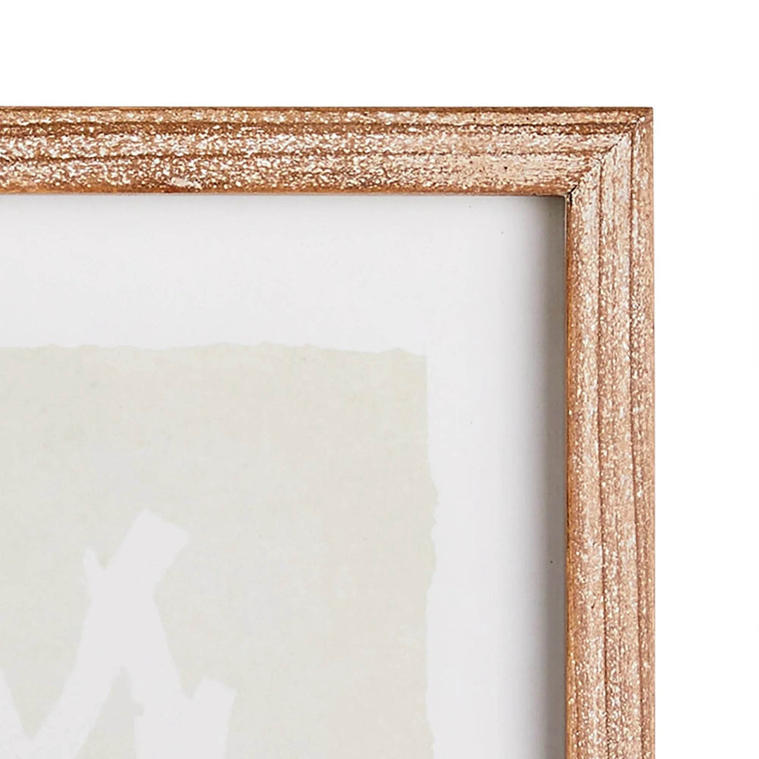 Close-up of whitewashed fir wood frame corner with visible texture and seaweed print detail – Coastal Cottage

